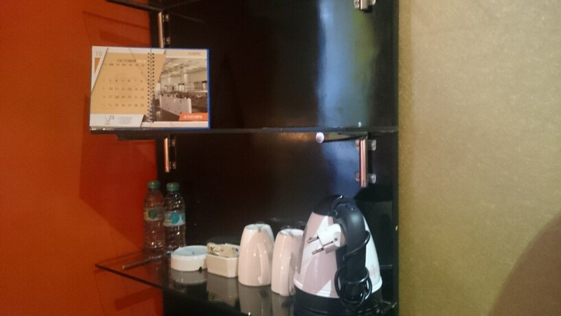 Imagen de la habitación del Hotel Sans Hotel International Surabaya. Foto 10