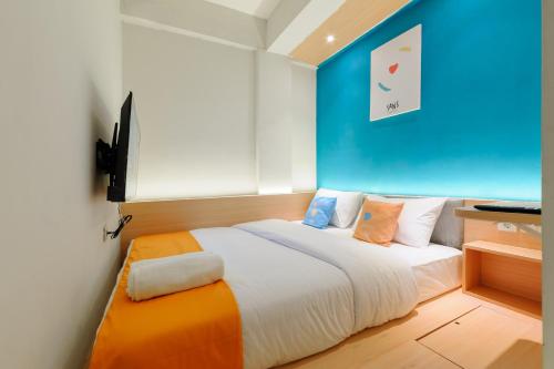 Imagen de la habitación del Hotel Sans Pesona Bekasi. Foto 20