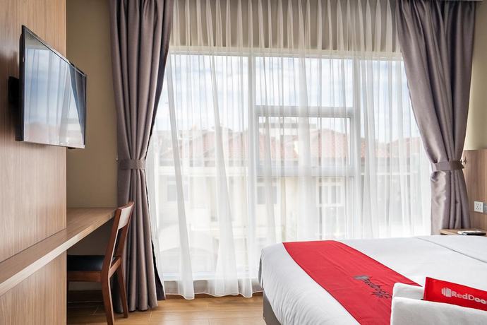 Imagen de la habitación del Hotel Sans Puri Indah Jakarta. Foto 9