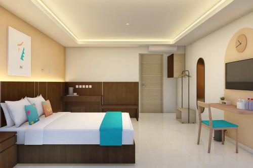 Imagen de la habitación del Hotel Sans Rumah Kita Daan Mogot. Foto 17