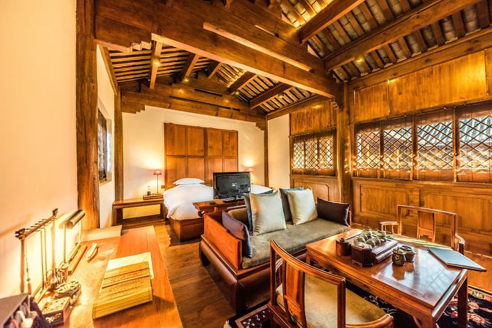 Imagen de la habitación del Hotel Sanshengwuer Zeyun Inns. Foto 2