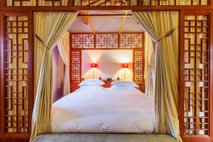 Imagen de la habitación del Hotel Sanshengwuer Zeyun Inns. Foto 3