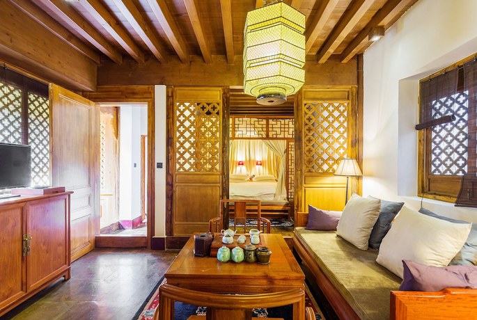 Imagen de la habitación del Hotel Sanshengwuer Zeyun Inns. Foto 4