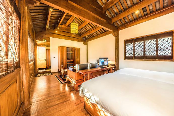 Imagen de la habitación del Hotel Sanshengwuer Zeyun Inns. Foto 7
