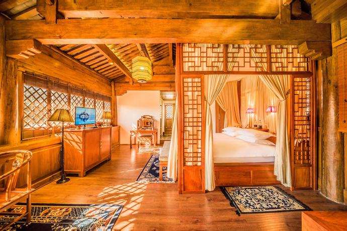 Imagen de la habitación del Hotel Sanshengwuer Zeyun Inns. Foto 12