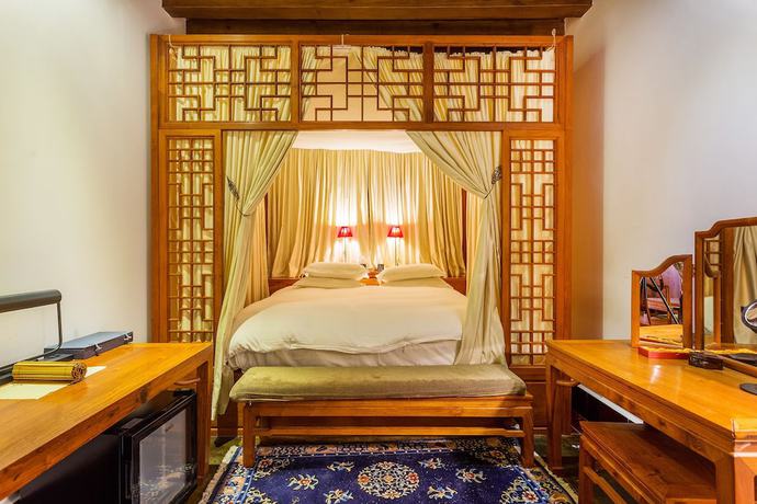 Imagen de la habitación del Hotel Sanshengwuer Zeyun Inns. Foto 16