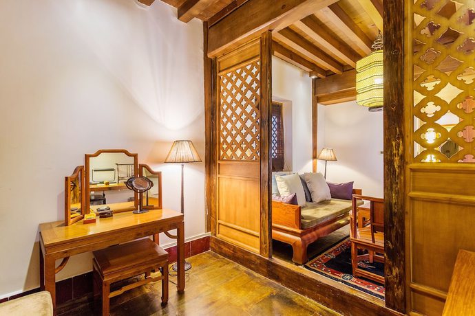 Imagen de la habitación del Hotel Sanshengwuer Zeyun Inns. Foto 17