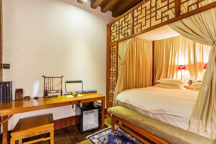 Imagen de la habitación del Hotel Sanshengwuer Zeyun Inns. Foto 19