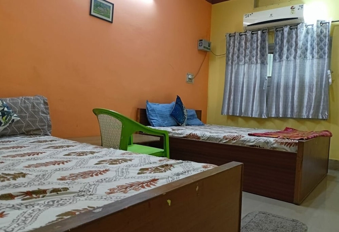 Imagen de la habitación del Hotel Sanskriti Paying Guest House. Foto 2