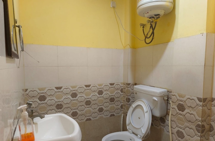 Imagen de la habitación del Hotel Sanskriti Paying Guest House. Foto 5