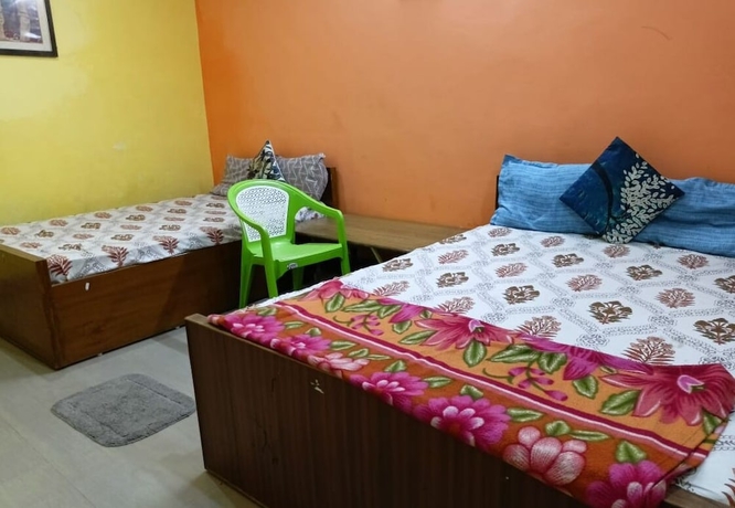 Imagen de la habitación del Hotel Sanskriti Paying Guest House. Foto 12