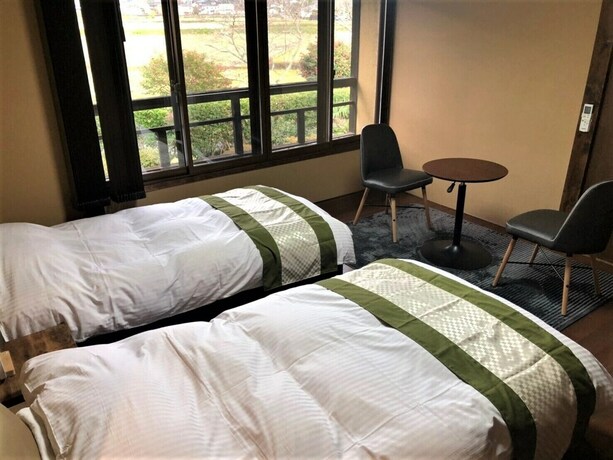 Imagen de la habitación del Hotel Sansou Tanaka. Foto 28