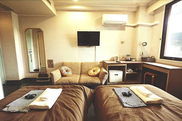 Imagen de la habitación del Hotel Sansui Global Inn. Foto 5