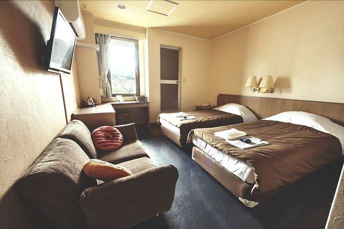 Imagen de la habitación del Hotel Sansui Global Inn. Foto 6