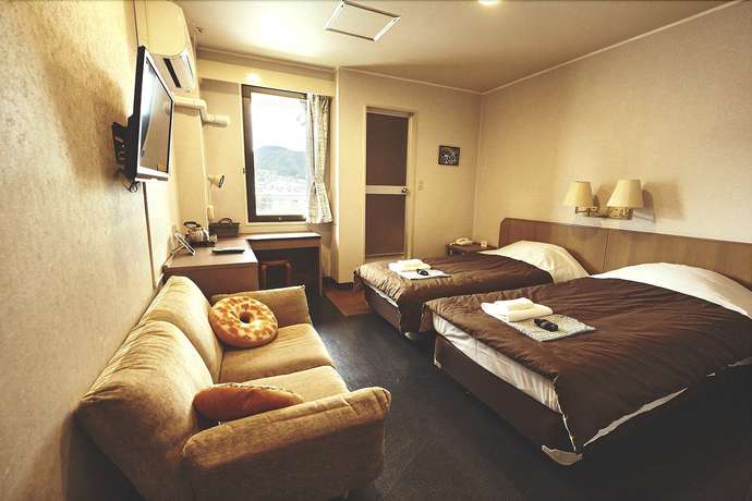Imagen de la habitación del Hotel Sansui Global Inn. Foto 7