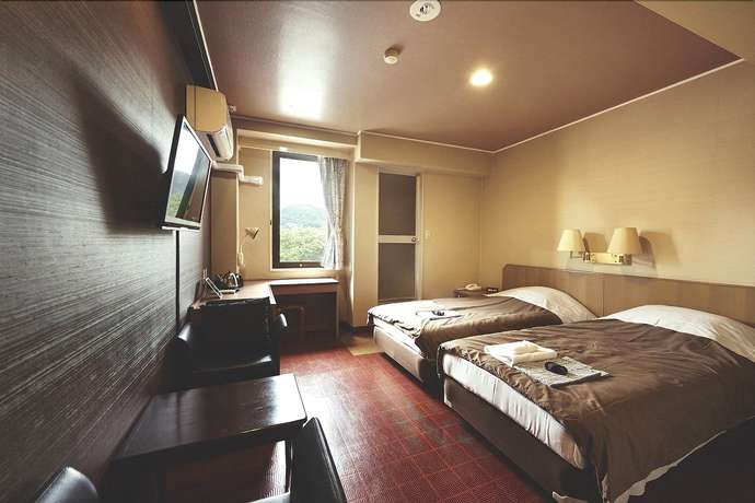 Imagen de la habitación del Hotel Sansui Global Inn. Foto 11