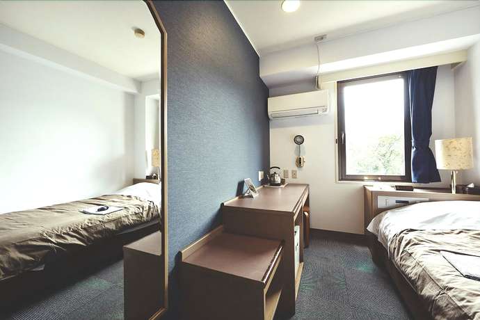 Imagen de la habitación del Hotel Sansui Global Inn. Foto 17