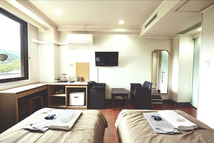 Imagen de la habitación del Hotel Sansui Global Inn. Foto 18