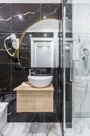 Imagen de la habitación del Hotel Sant Angelo Palace. Foto 18