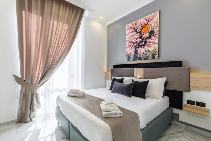Imagen de la habitación del Hotel Sant Angelo Palace. Foto 20