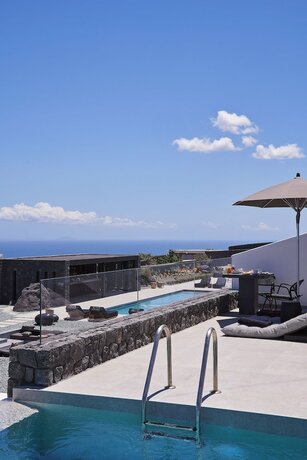 Imagen de la habitación del Hotel SantAnna Luxury Suites. Foto 20