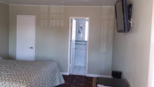 Imagen de la habitación del Hotel Santa Ana Travel Inn. Foto 2