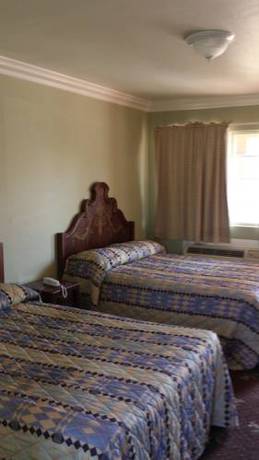 Imagen de la habitación del Hotel Santa Ana Travel Inn. Foto 9