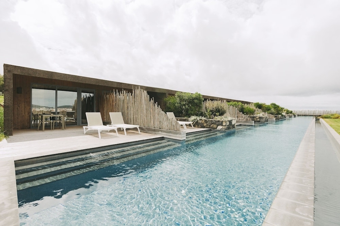 Imagen de la habitación del Hotel Santa Barbara Eco Beach Resort. Foto 8