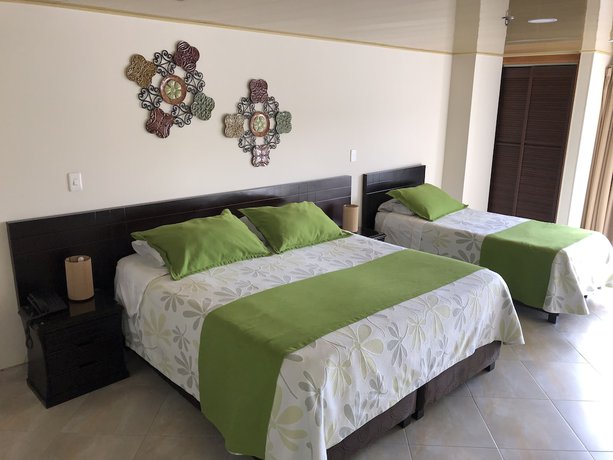 Imagen de la habitación del Hotel Santa Barbara Usaquen Inn. Foto 3