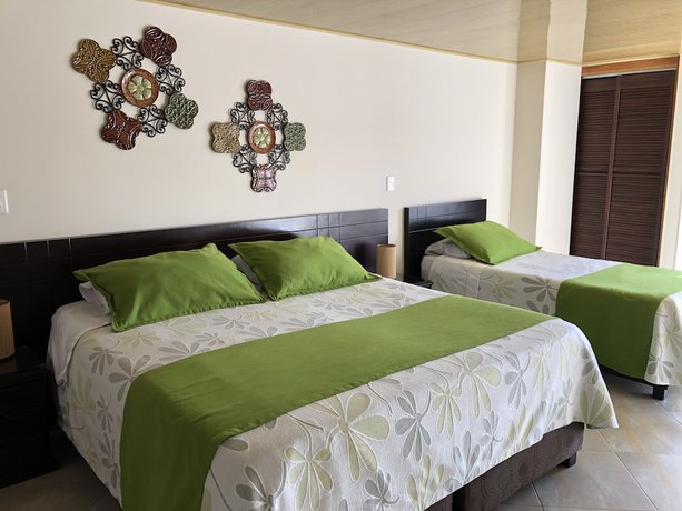 Imagen de la habitación del Hotel Santa Barbara Usaquen Inn. Foto 16