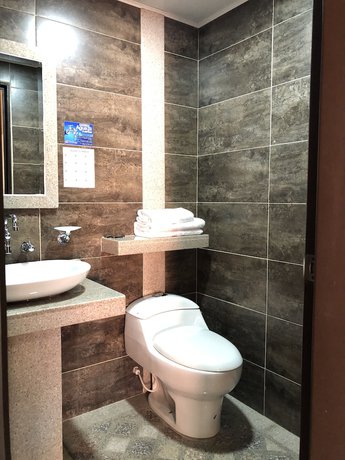 Imagen de la habitación del Hotel Santa Barbara Usaquen Inn. Foto 19