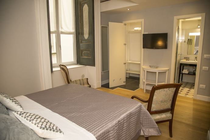 Imagen de la habitación del Hotel Santa Chiara Boutique. Foto 3