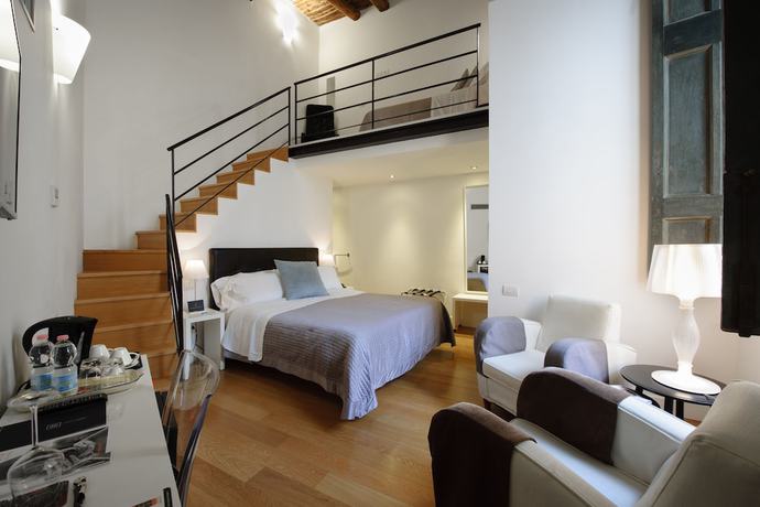 Imagen de la habitación del Hotel Santa Chiara Boutique. Foto 5