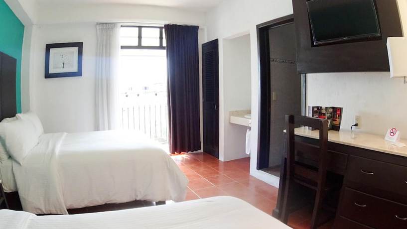 Imagen de la habitación del Hotel Santa Fe, Tlatlauquitepec. Foto 5