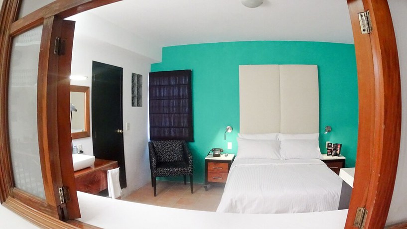 Imagen de la habitación del Hotel Santa Fe, Tlatlauquitepec. Foto 15