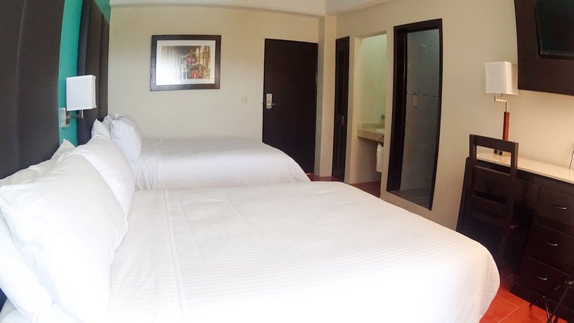 Imagen de la habitación del Hotel Santa Fe, Tlatlauquitepec. Foto 16