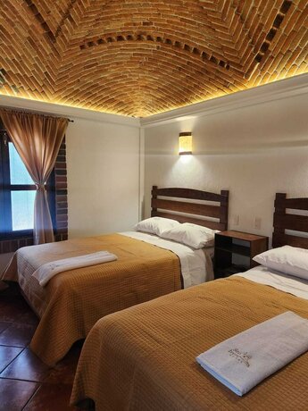 Imagen de la habitación del Hotel Santa Irene, Cholula de Rivadabia. Foto 17