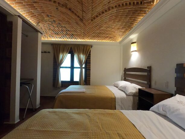 Imagen de la habitación del Hotel Santa Irene, Cholula de Rivadabia. Foto 18