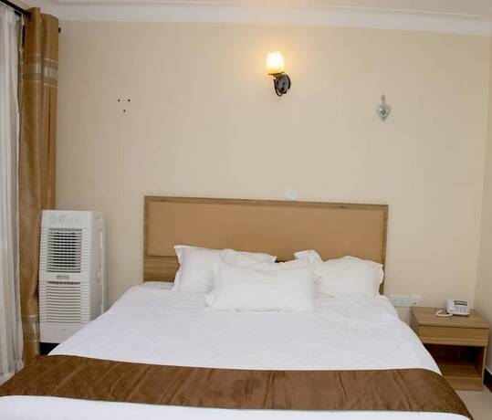 Imagen de la habitación del Hotel Santa Maria Entebbe. Foto 18