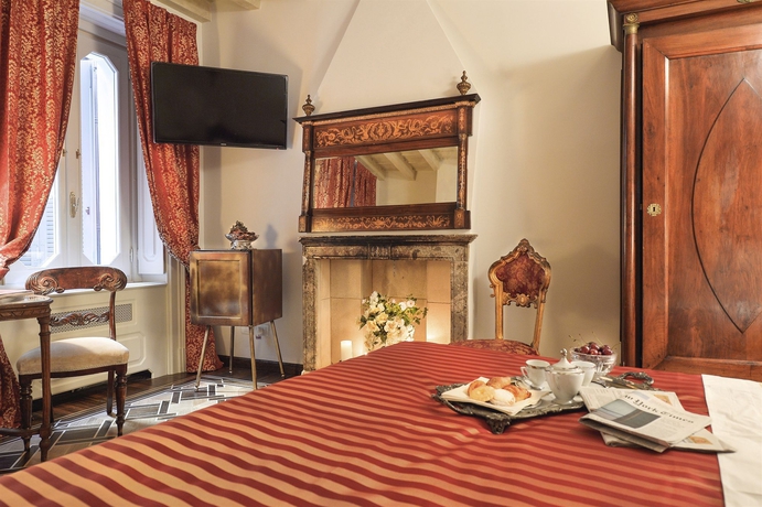 Imagen de la habitación del Hotel Santa Marta Suites. Foto 6