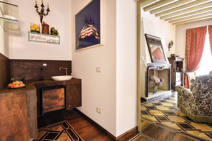 Imagen de la habitación del Hotel Santa Marta Suites. Foto 10