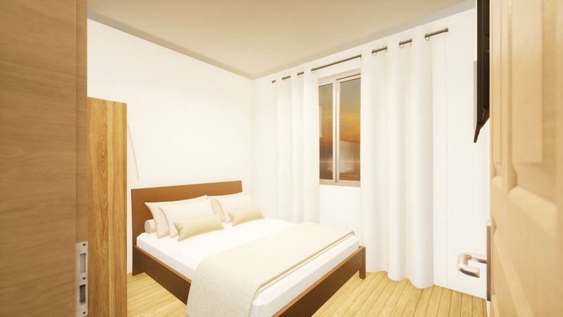 Imagen de la habitación del Hotel Santa Martha Bungalows. Foto 6