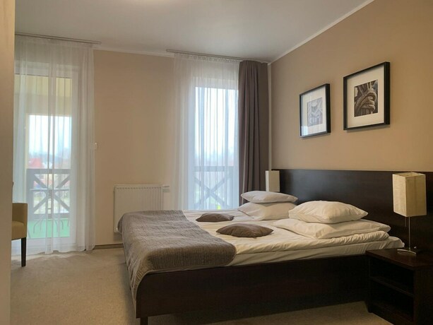 Imagen de la habitación del Hotel Santa Monica, Mikolajki. Foto 24