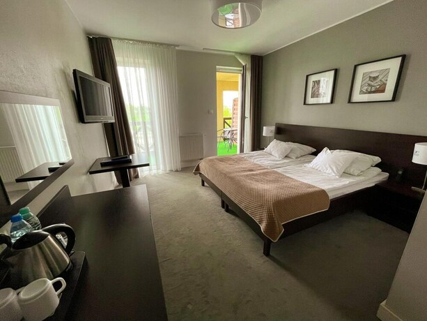 Imagen de la habitación del Hotel Santa Monica, Mikolajki. Foto 25
