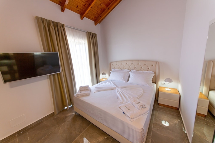 Imagen de la habitación del Hotel Santa Oliva Suites. Foto 12