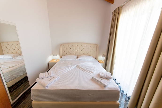 Imagen de la habitación del Hotel Santa Oliva Suites. Foto 13