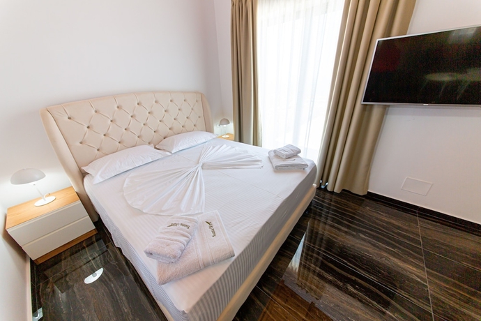 Imagen de la habitación del Hotel Santa Oliva Suites. Foto 14