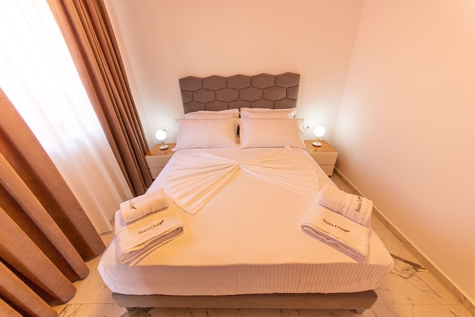 Imagen de la habitación del Hotel Santa Oliva Suites. Foto 17