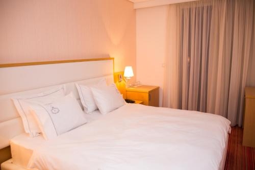 Imagen de la habitación del Hotel Santa Quaranta Premium Resort. Foto 6