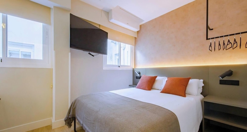 Imagen de la habitación del Hotel Santa Sofia Suites. Foto 3